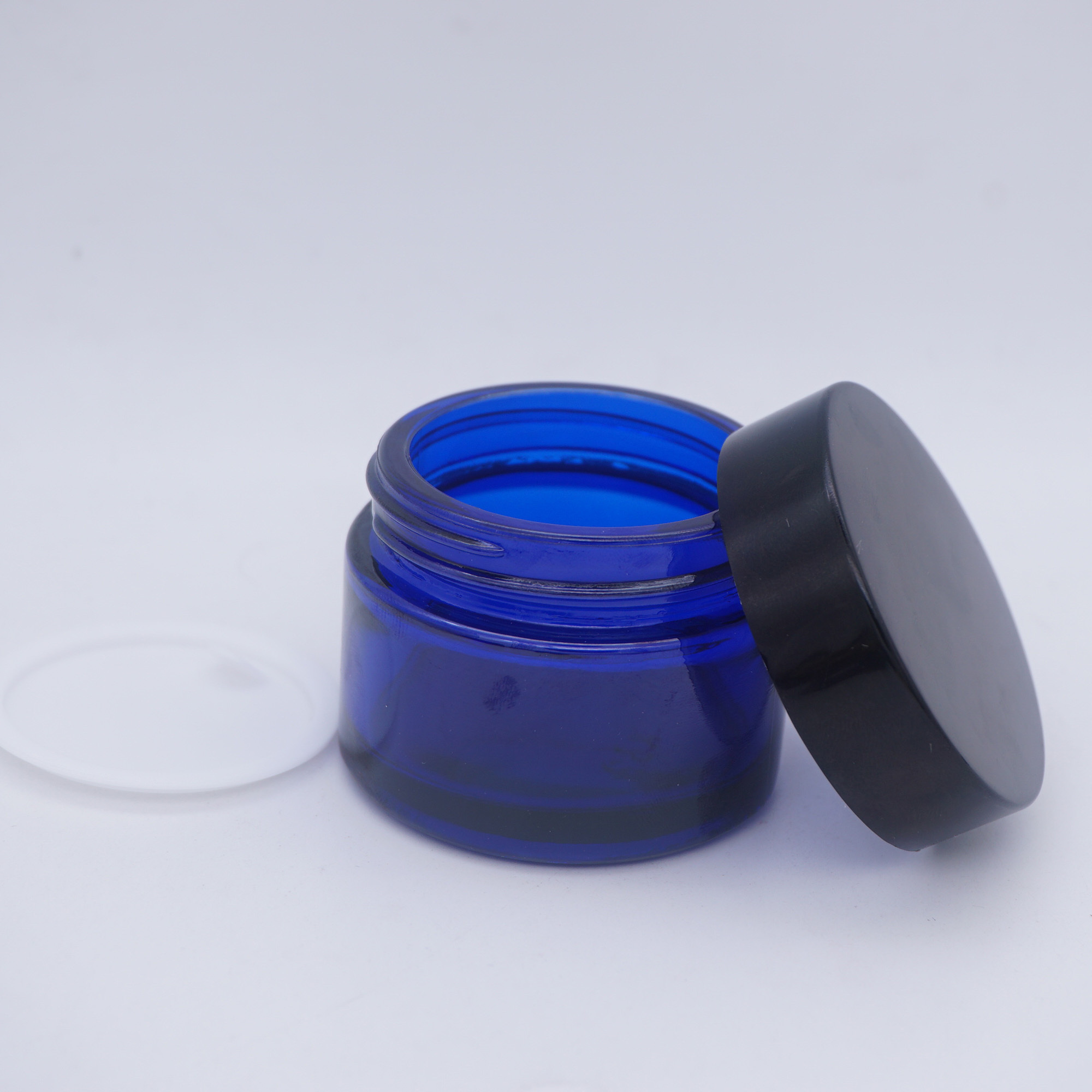 cosmetic blue 1/3 oz  glass jars  with rose lid