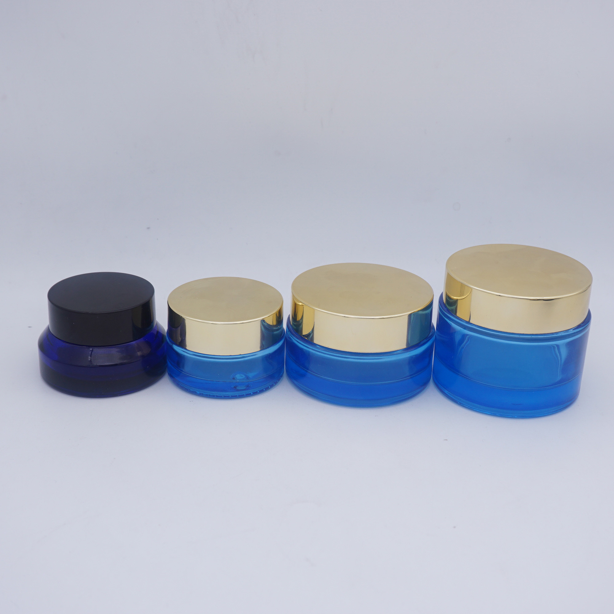 cosmetic blue 1/3 oz  glass jars  with rose lid