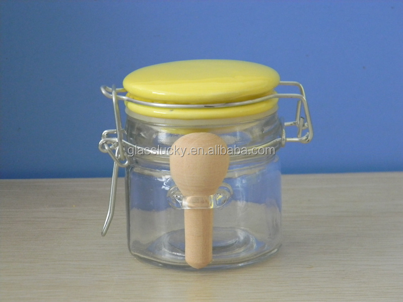 KW6602SS cheap swing top wholesale glass jar with spoon and ceramic lid for spices