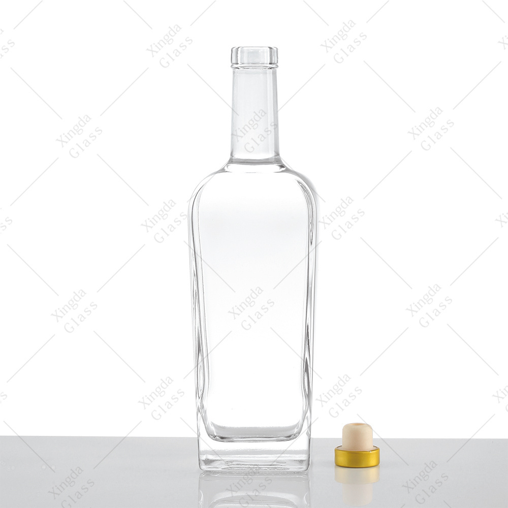 China Factory Direct Sale Custom Design Shape Liquor Glass Bottle 700 ml Exotic Transparent Glass Bottle with Stopper Cork