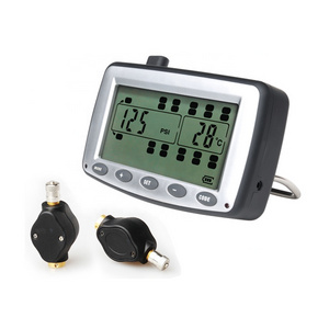 Truck Tire Pressure Monitoring System with flow thru TPMS sensor