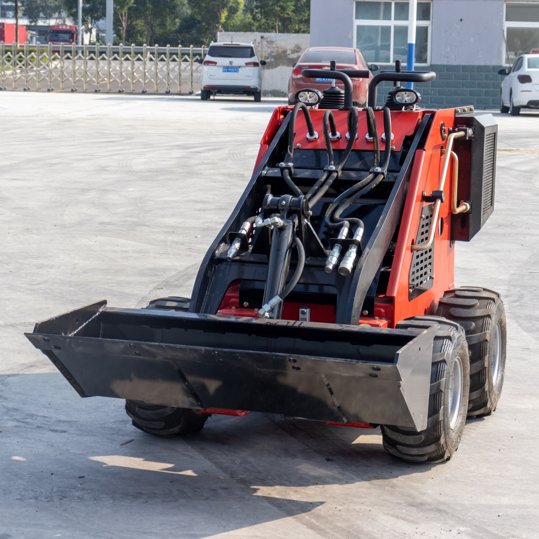 mini skid steer loader with accessories like Dingo