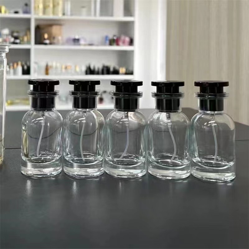 Wholesale custom logo 30ml 50ml 100ml empty glass perfume bottle spray round luxury bottle perfume with box