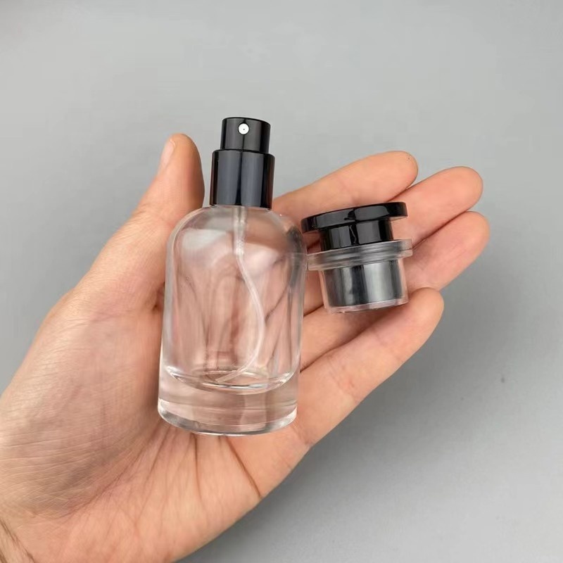 Wholesale custom logo 30ml 50ml 100ml empty glass perfume bottle spray round luxury bottle perfume with box