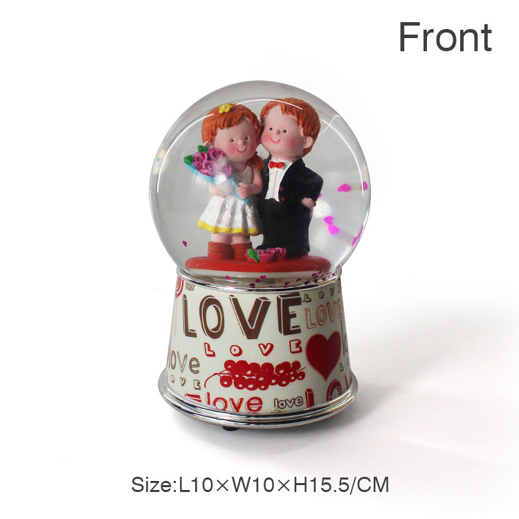 New product romantic musical spinning water globe custom resin wedding souvenir  music snow globe ornament