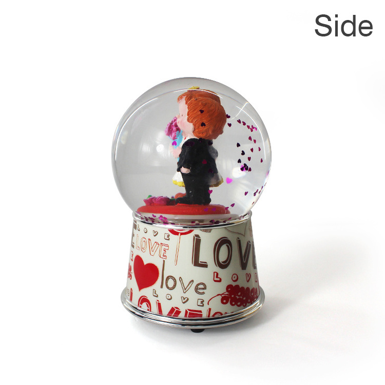 New product romantic musical spinning water globe custom resin wedding souvenir  music snow globe ornament