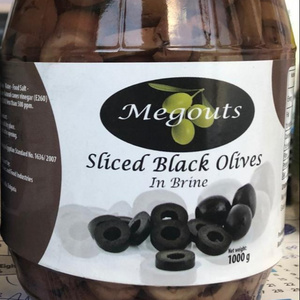 Natural black olives in glass jar