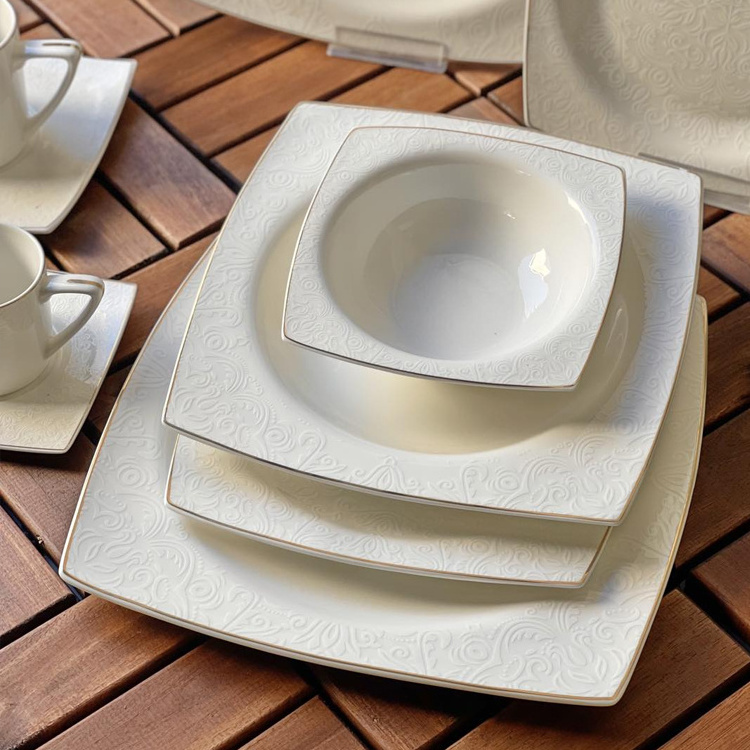 Luxury tableware kitchen dinner sets handmade porcelain white embossed decal design fine bone china dinner set for wedding