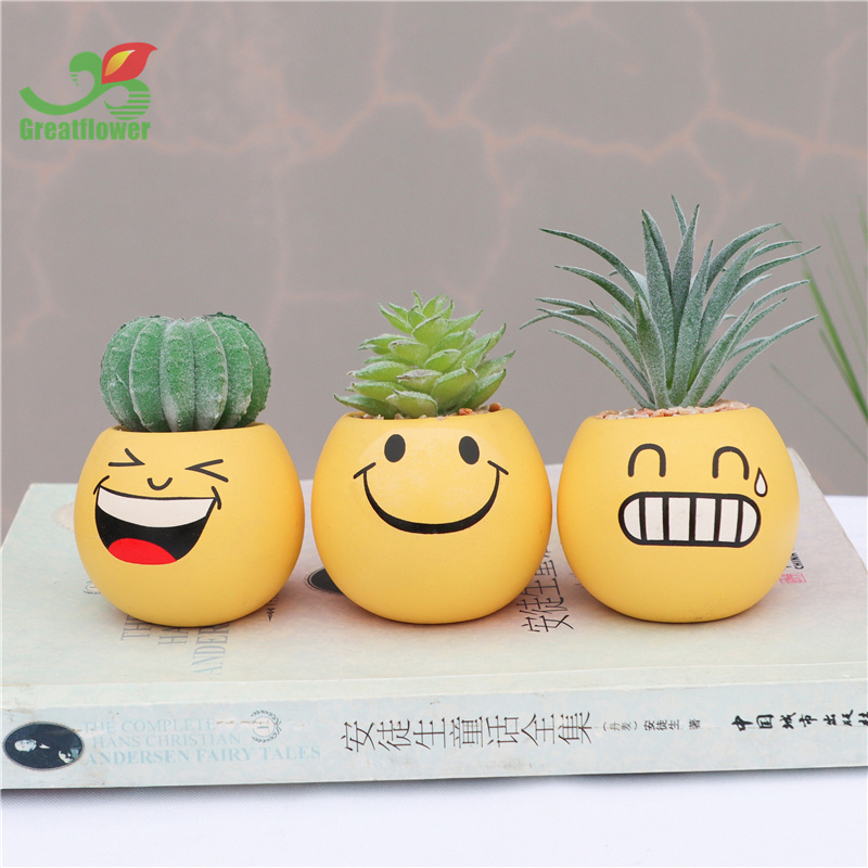 Modern custom cheap smile face round yellow glazed ceramic small bulk flower pots with Artificial Succulents for decor