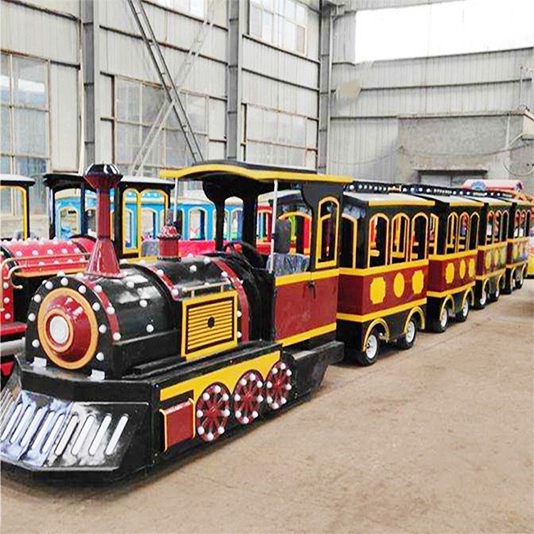 Popular tourist attraction fun park rides family game 1 locomotive 4 coaches electric road steam trackless train for sale