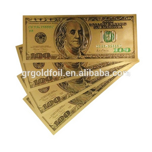 Gold currency US dollar banknotes gold $100 bills