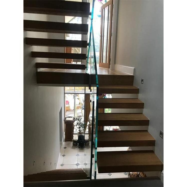 Solid wood led light floating staircase invisible steel stringer stairs with tempered glass railing