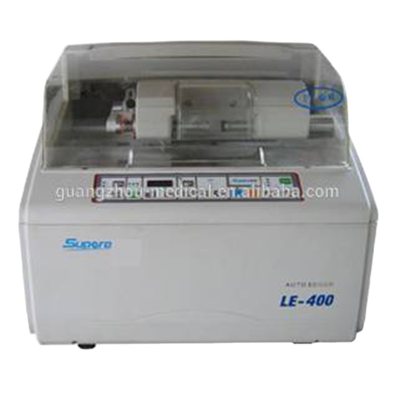 Optical Lenses Cutting Fixing, Optical Lenses Cutting Fixing machines, Lens Auto edger machine