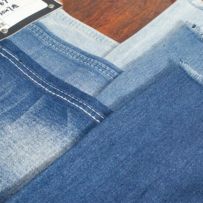 Stock lot 3/1 10*7 ultra dark blue cheap denim fabric