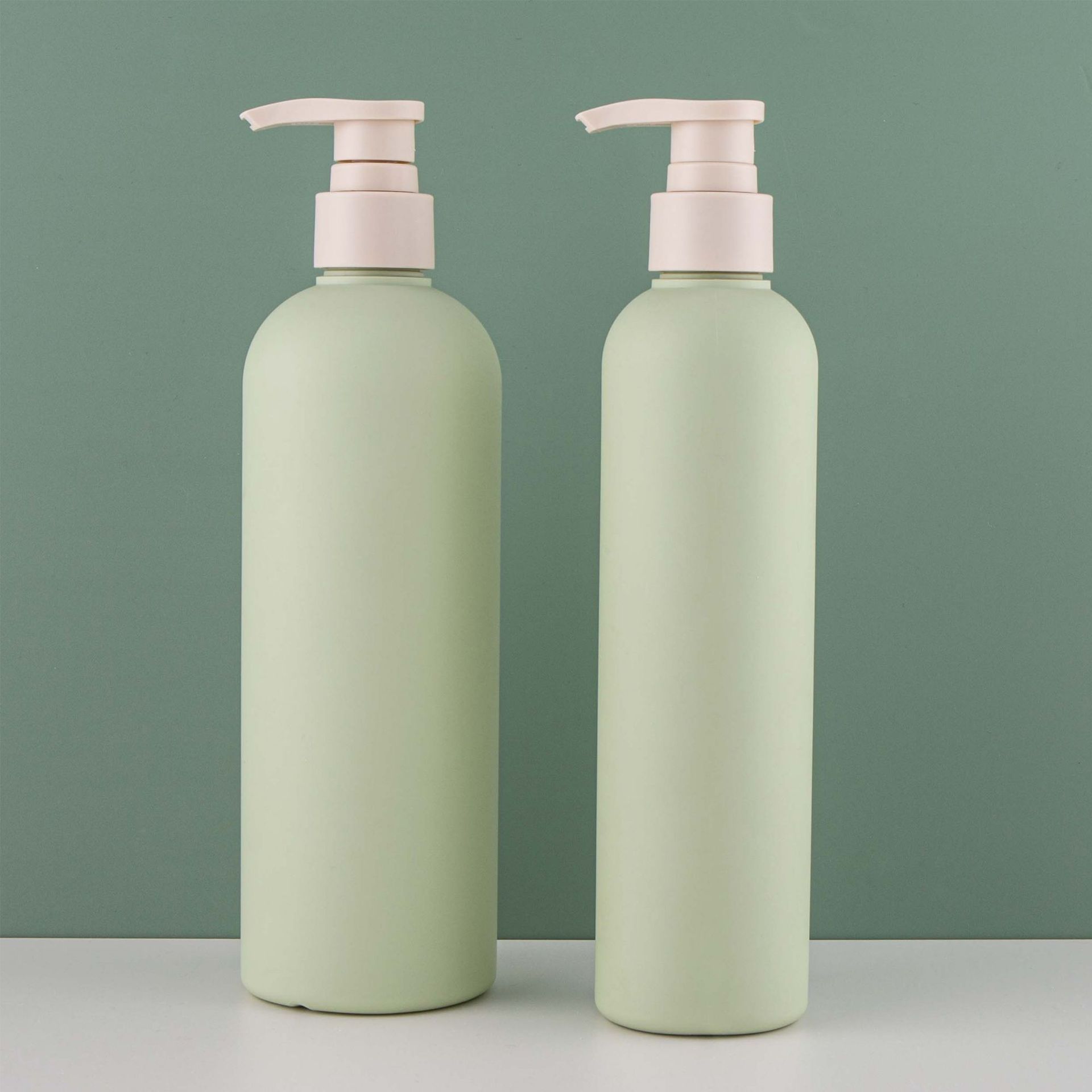 Green Plastic Cylindrical Cosmetic HDPE Bottle with Water Shampoo Dispenser Lotion Pump Shower Gel 200/260/300/400/500ML