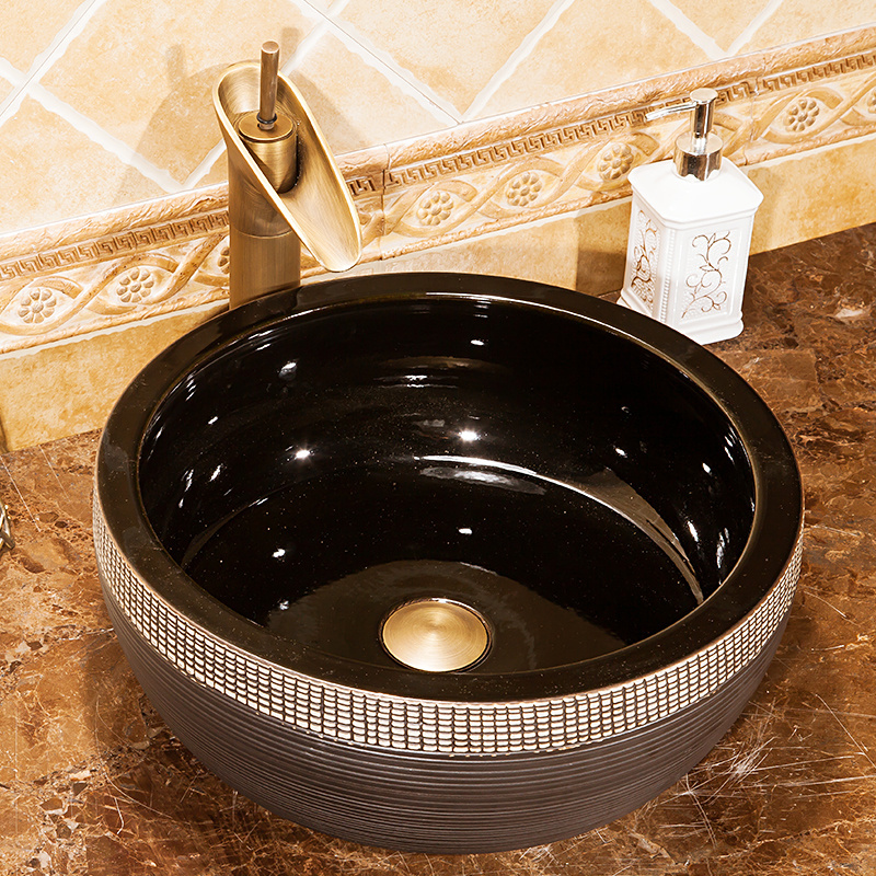 China Artistic Handmade Art Wash Basin Ceramic Counter Top Ceramic Wash Basins Round Carved Bathroom Sinks