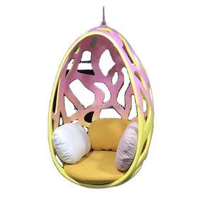 Modern designer fiberglass fiber hollowed out cradle Rocking chair patio indoor outdoor swing hanging egg chair