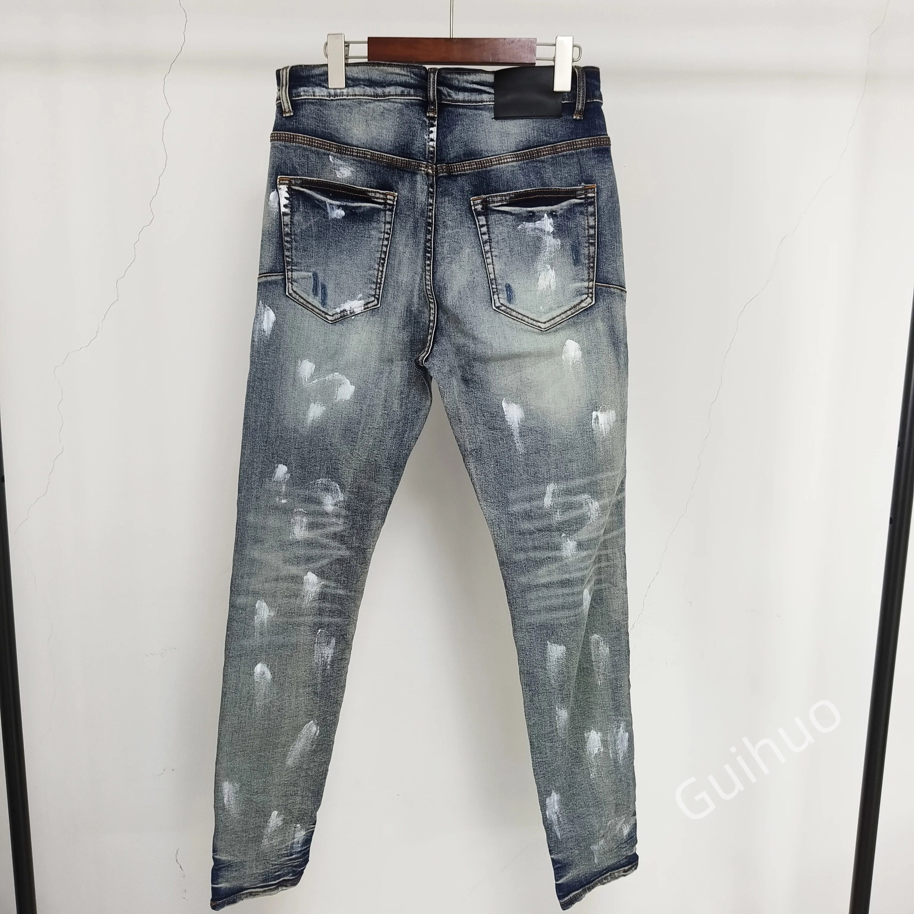 2023 unique men designer jeans oil printed hole custom crumple jeans for men skinny jeans