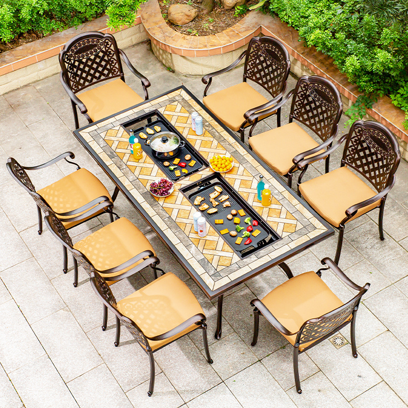 Low MOQ waterproof Outdoor dining table with BBQ For Restaurant Cast Aluminum ceramic tile Patio Furniture Sets With Fire Pit