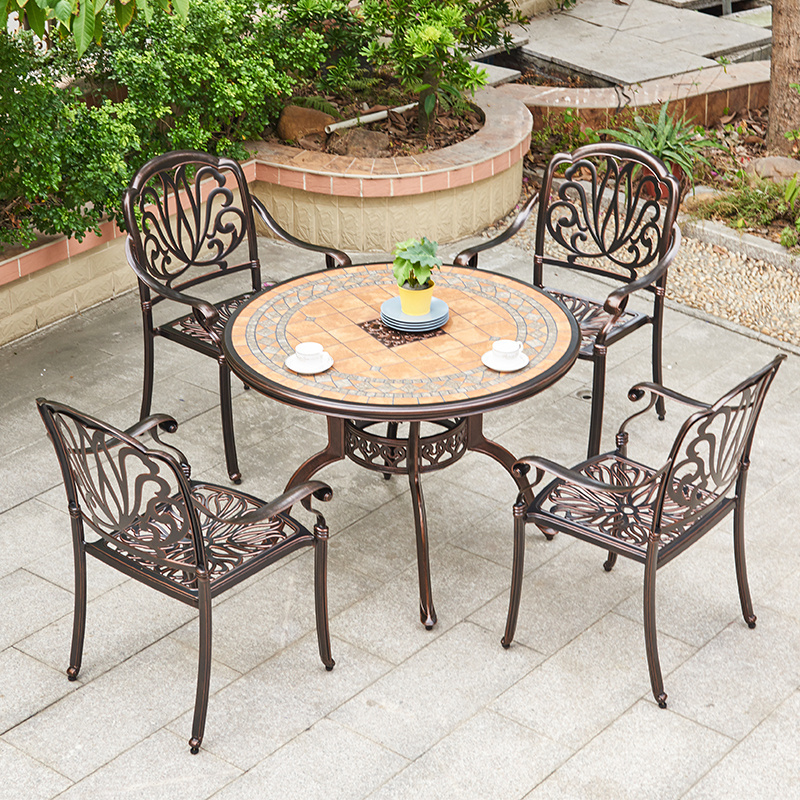 Best selling cast aluminium patio table and chairs luxury fashion mobili da giardino outdoor ceramics restaurant furniture set