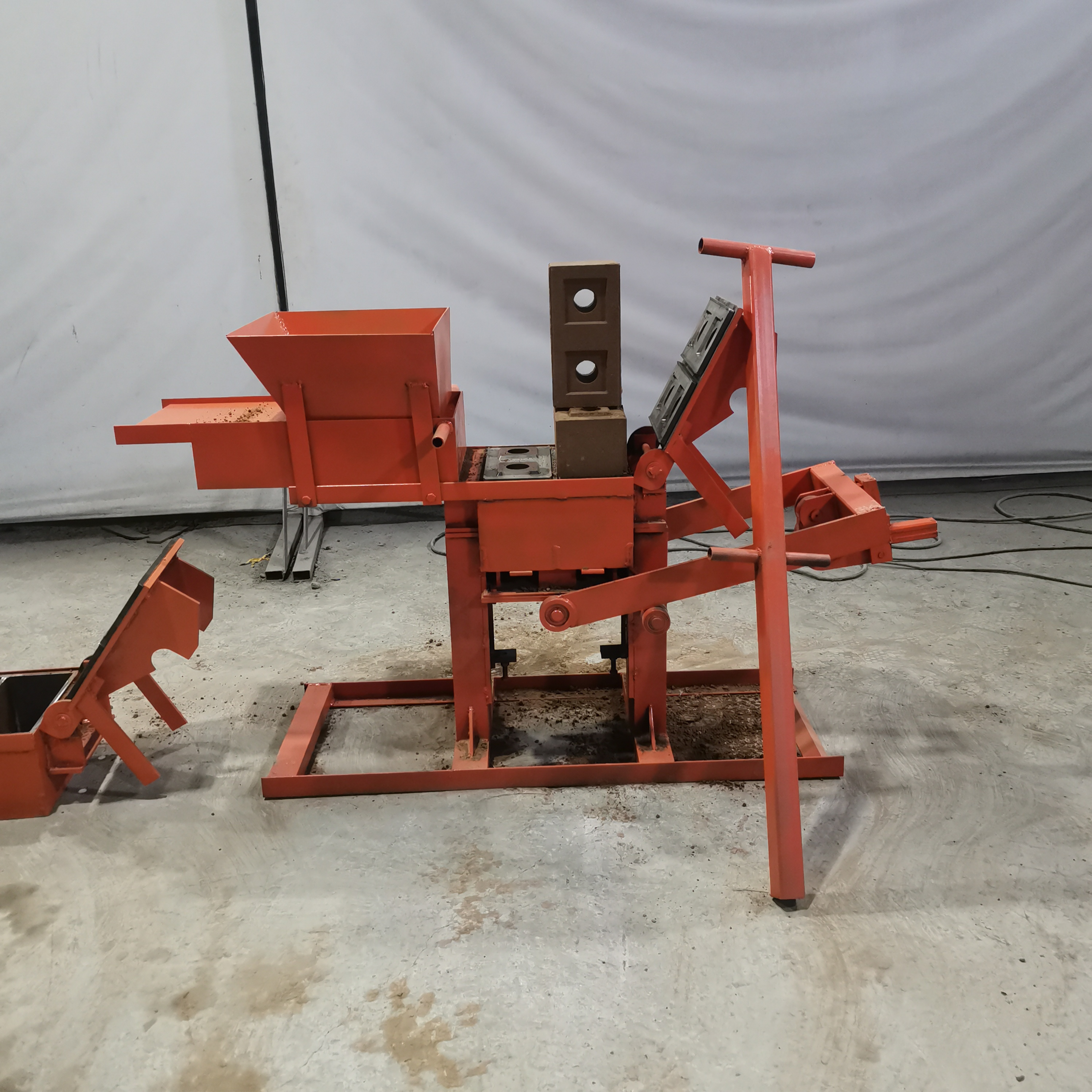 Small manual interlocking hollow solid red clay mud clay brick block machine 300-150-100mm lego brick