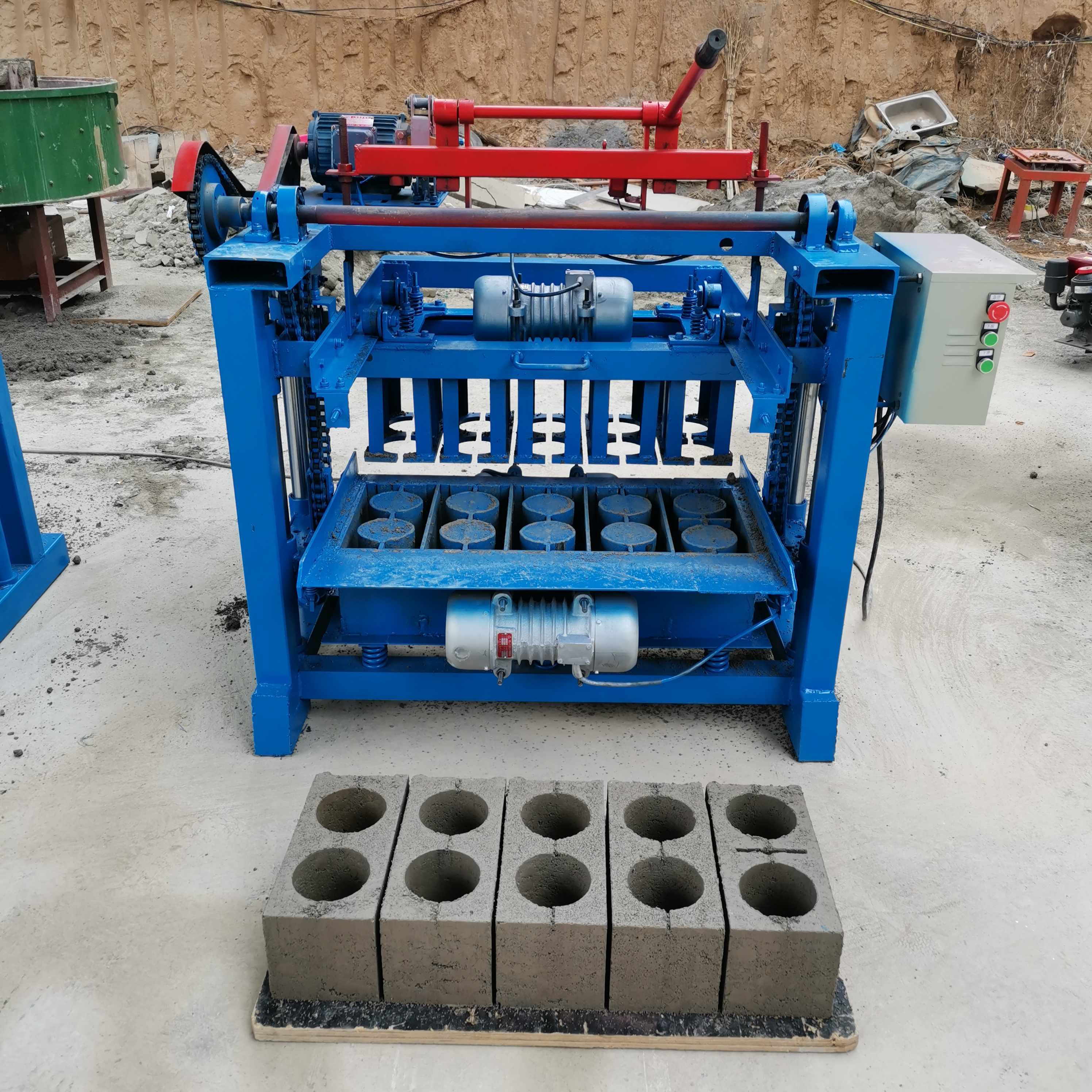 4-35Low cost brick making machinery block making machine make390-190-190 round hole hollow brick automatic brick machine