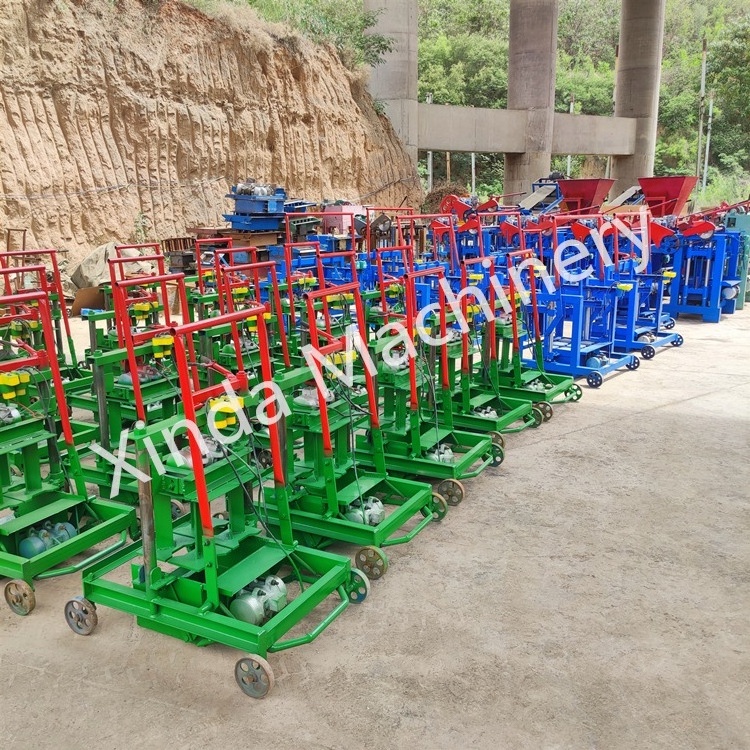 Small Scale Hot Selling Cheap Manual Interlocking Block Molding Cement Hollow Paving Brick Making Machine Price For Sale