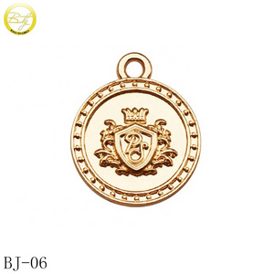 Custom made circle embossed jewelry logos gold plated bracelet decoration metal alloy charms for necklace