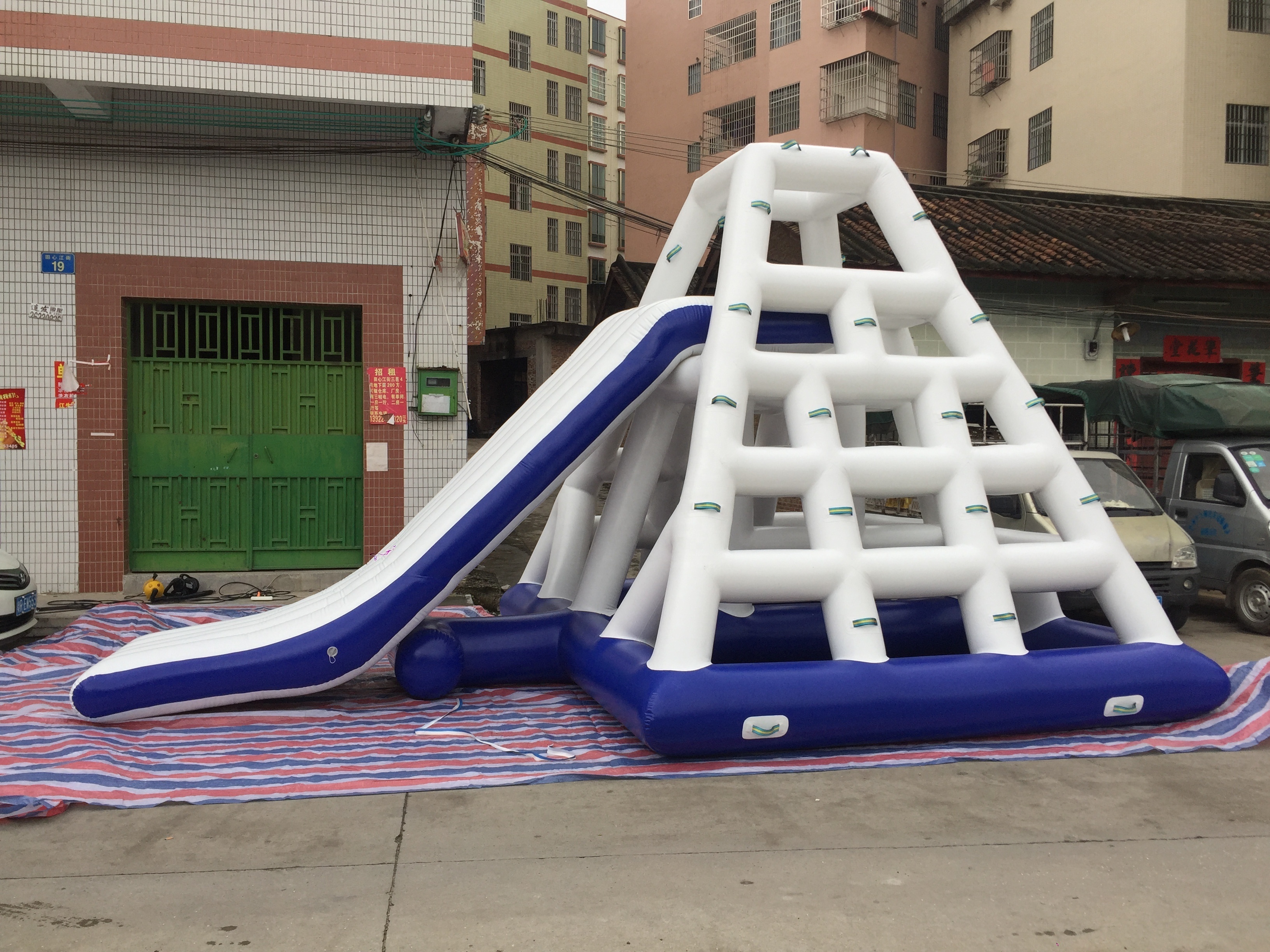 Cheap inflatable water slide pool pyramid rock climbing water toys for sale