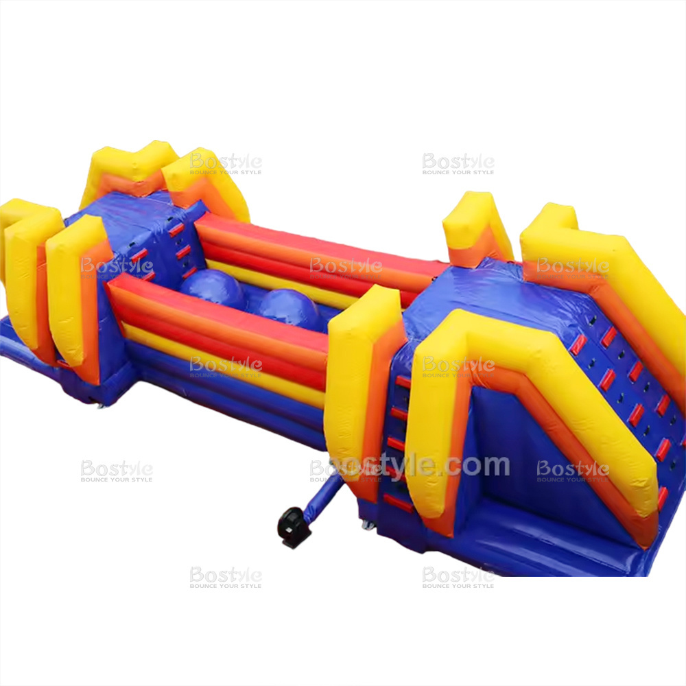 Inflatable Wipeout style bouncing balls obstacle course and drop slide for sale