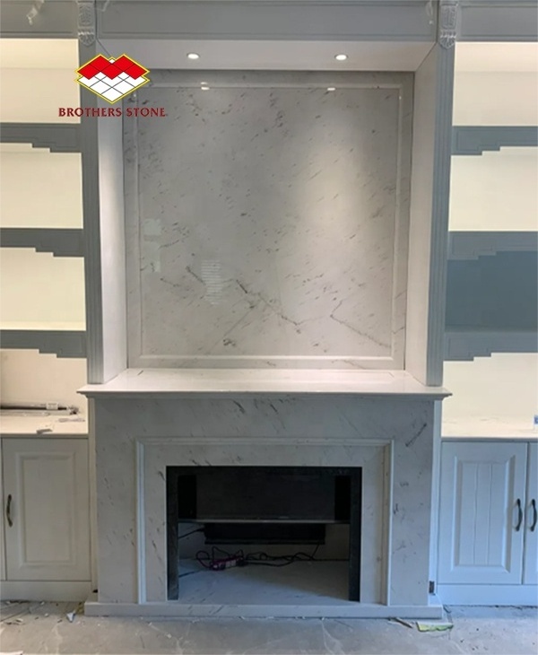 Aristonwhite marble ceiling mounted fireplace indoor