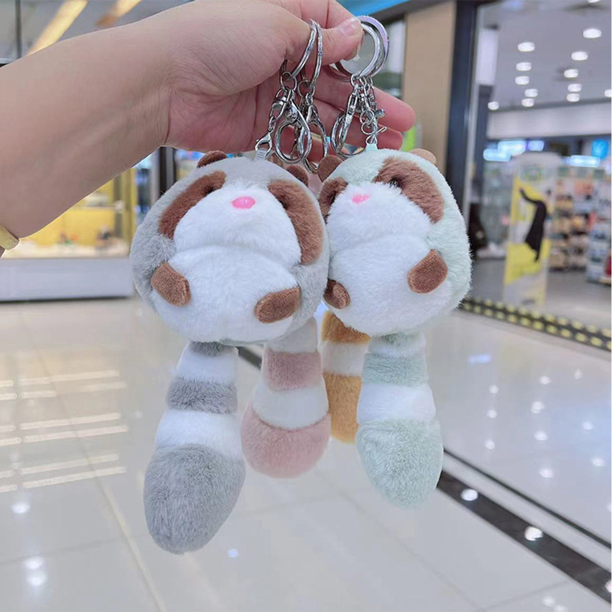 Hot Sales kids kawaii cute cartoon designer car key chains toy keyrings Odd tailed bear Little raccoon Plush keychain bag charms