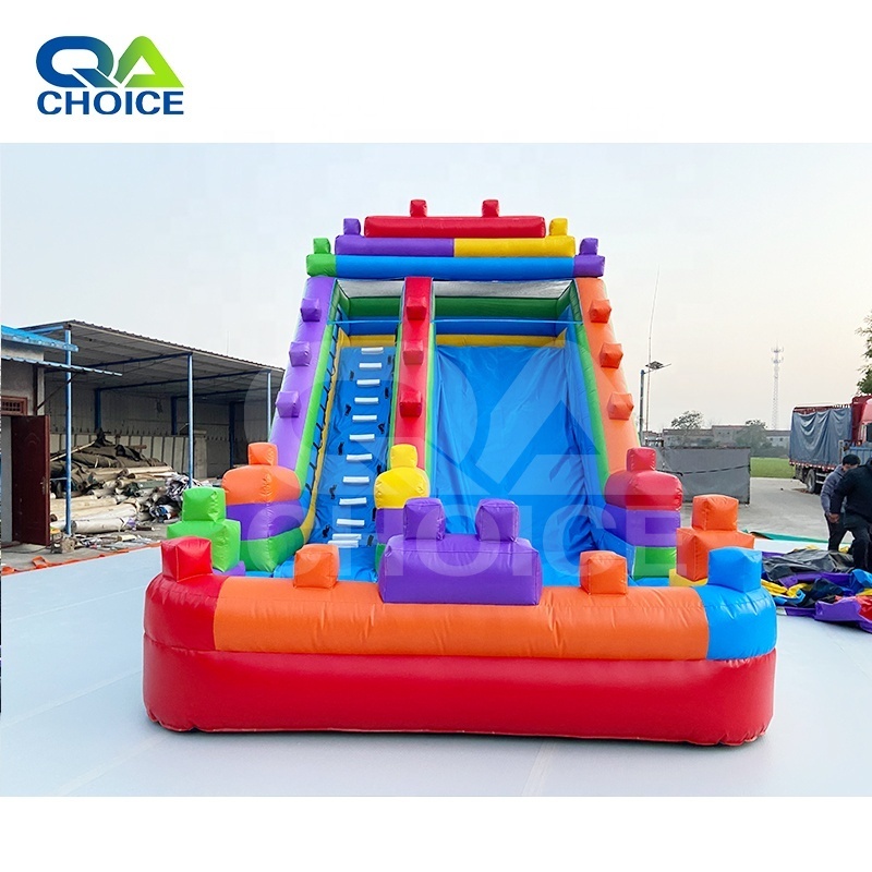 Hot Selling Cartoon Theme Inflatable Jumping Bouncer House Legoing Slide With Pool For Outdoor Carnival