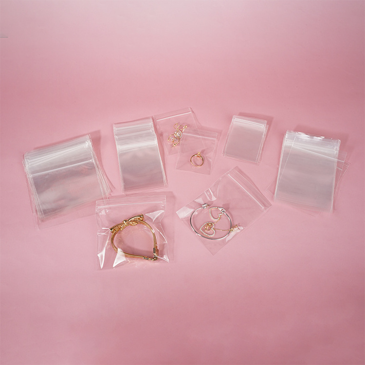 Custom self adhesive sealing transparent clear small plastic packaging ring earring chain jewelry pvc zipper bag for jewellery