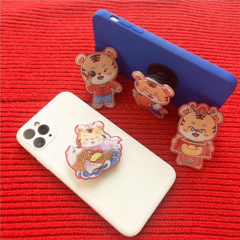 Tiger Year cartoon gold foil drip glue stand New Year lazy people retractable table support back stick mobile phone ring buckle