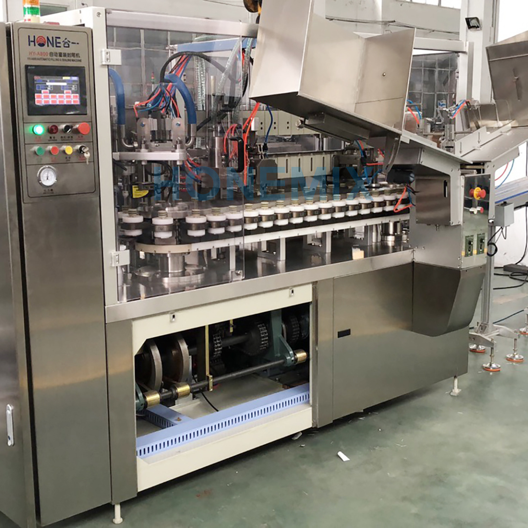 Full automatic high speed 2-heads plastic tube filling heating machine and sealing machine small tube filling packing machine