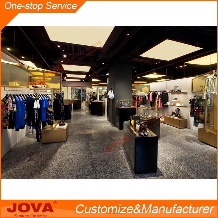 Unisex clothing stores design clothing showroom interior design with round clothing display racks