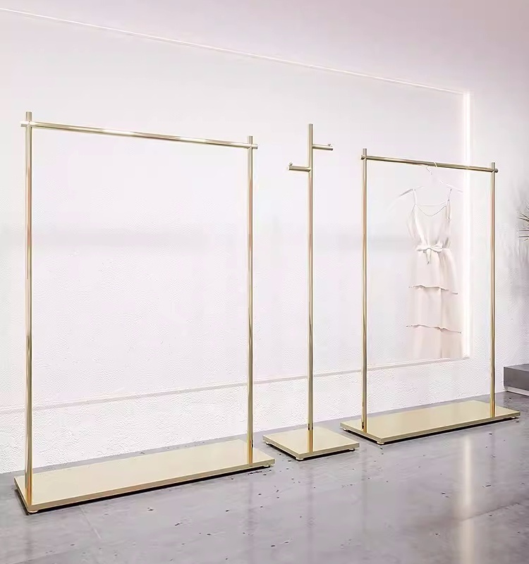 minimalist style clothing store stainless steel shiny gold boutique furniture display rack clothing