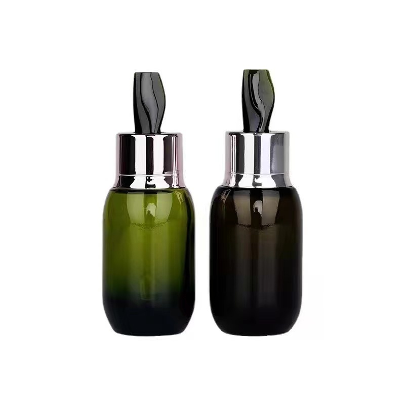 15ml 30ml 50ml green Hot Sale Luxury Spray Dropper Glass Essential Oil Glass Bottle For Essence Skincare