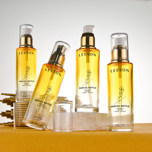 Unique Luxury Cosmetic Clear Empty Glass Hair Oil Serum Lotion Pump Bottle With Gold Plastic Pump Head