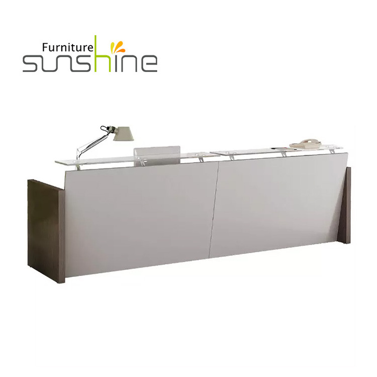 White cheap office reception desk with chairs for big office