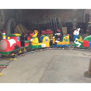 Children outdoor cartoon big electric ride on train toy with track