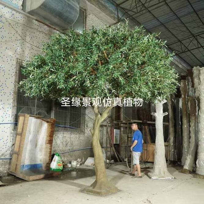 Large tall artificial plastic green ficus banyan tree