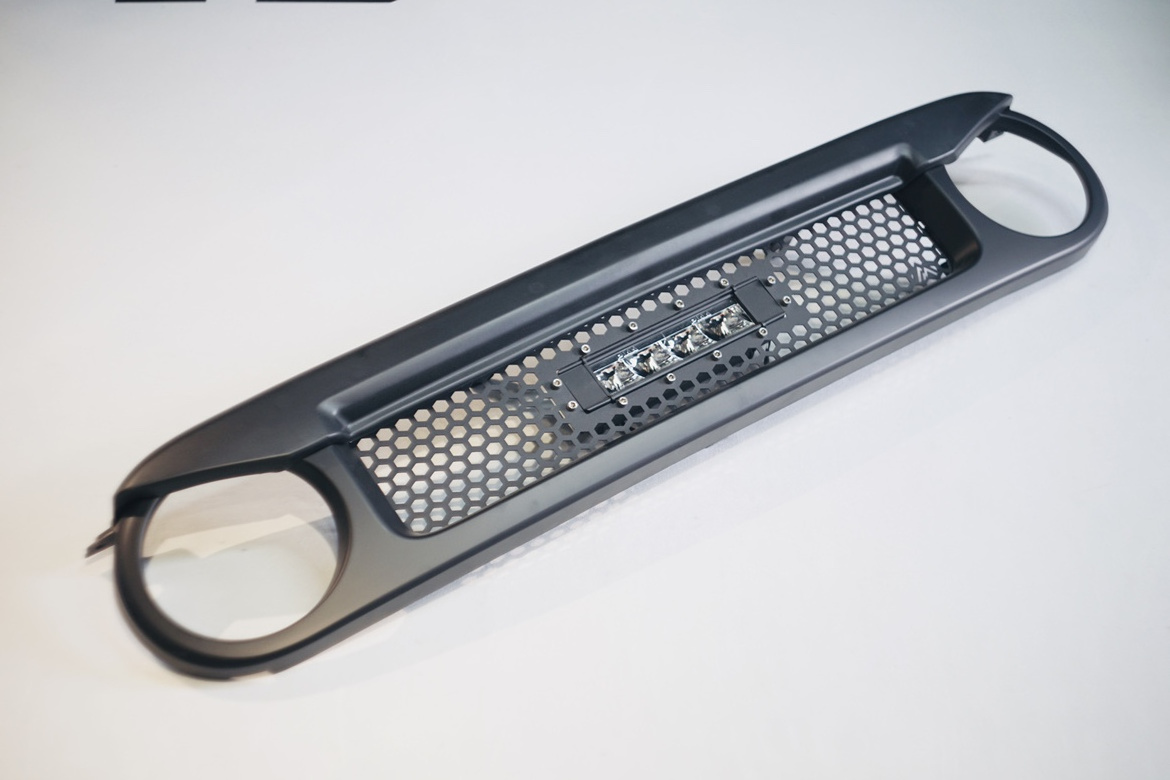 TS-FJ-043Retrofitted PIaa in the grid LED spotlights on the front grille for FJ Cruiser 2007-2020