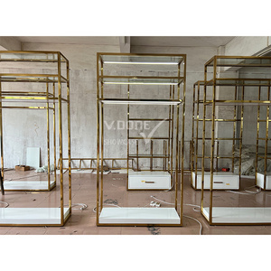 Fashion Boutique Store Layout Hanging Garment Display Rack Golden Clothes Display Stand For Women Clothing Store Furniture