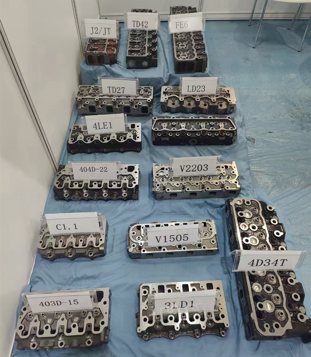 Factory sales kubota engine spare parts cylinder head with valves