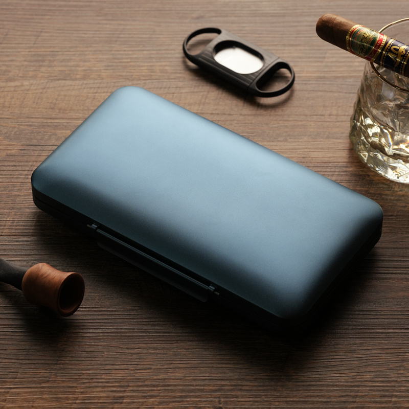 An aluminium blue and white travel cigarette case for 5 cigars