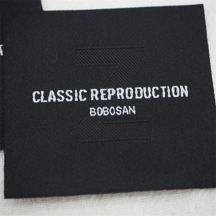 Eco-friendly Luxury Custom clothing label woven label making machine Sustainable premium woven label