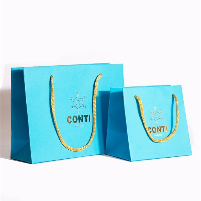 Hot selling ribbon bowknot matt lamination black shopping gift paper bag packaging with your own logo