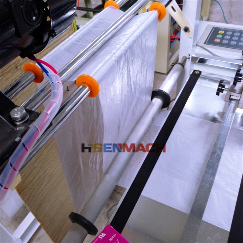 Single line heat cutting sealing biodegradable t-shirt plastic bag making machine price manufacture